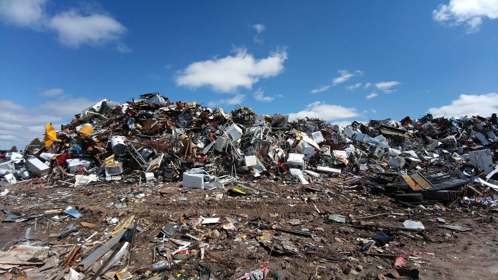 A pile of trash at a landfill