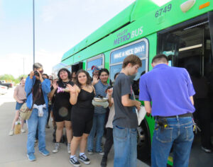 Students getting on Valley Metro bus